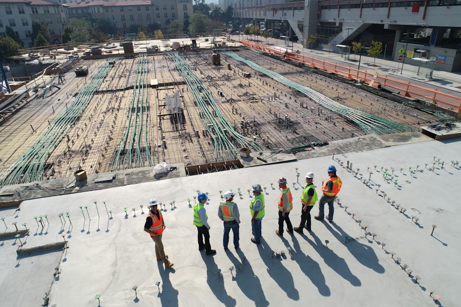 Construction team standing together on site