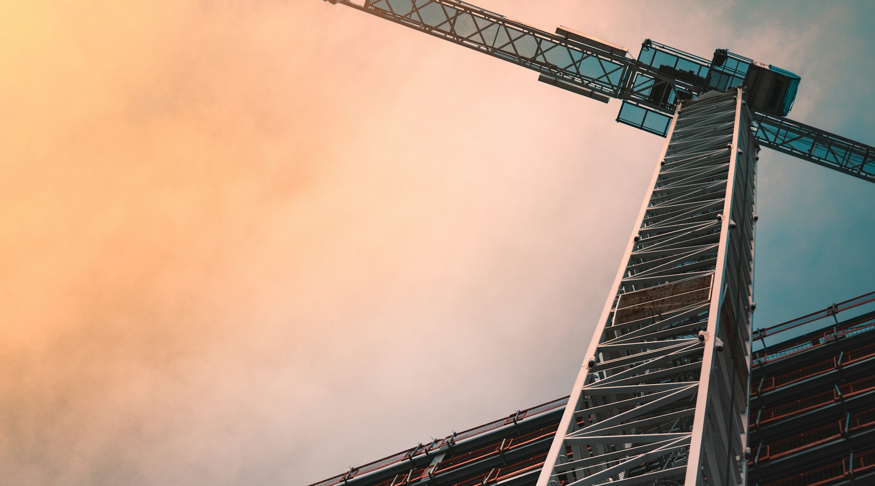 Tower crane against the sky at a construction site